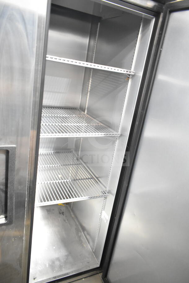 2022 True T-35-HC commercial 2-door reach-in cooler, 115 volts, 1 phase, featuring multiple shelves and spacious interior.