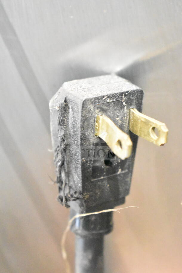 Damaged plug on a 2022 True T-35-HC Commercial Reach-In Cooler. 115 Volts, 1 Phase. Needs repair or replacement.