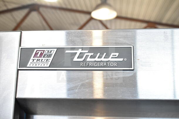 2017 True T-35 commercial 2-door reach-in cooler, 115 volts, 1 phase. True branding visible on stainless steel exterior.