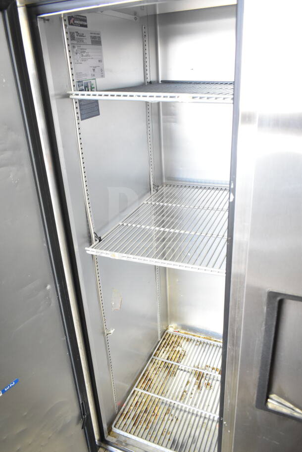 2022 True T-35-HC Commercial 2 Door Reach-In Cooler, 115V, 1 Phase, with interior shelves, visible model label, used condition.
