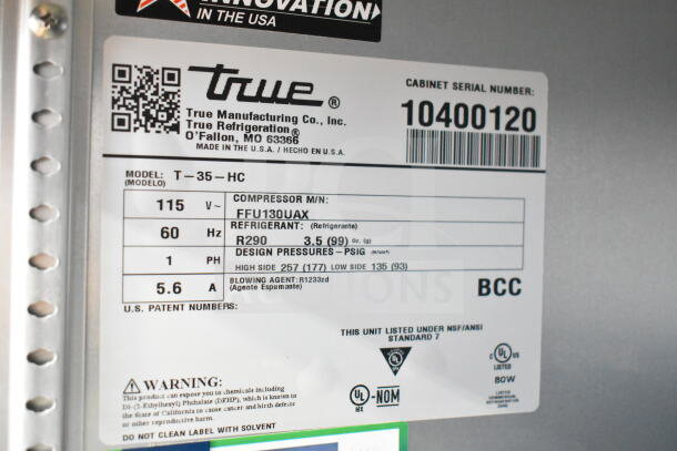2022 True T-35-HC Commercial 2 Door Cooler label reads model T-35-HC, 115V, 1 Phase, R290 refrigerant. Serial 10400120.
