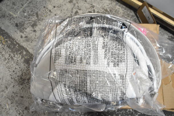 Brand new Ingenuity InLighten Bouncer "Twinkle Tails" in packaging. Item labeled "scratch and dent," indicating minor imperfections.