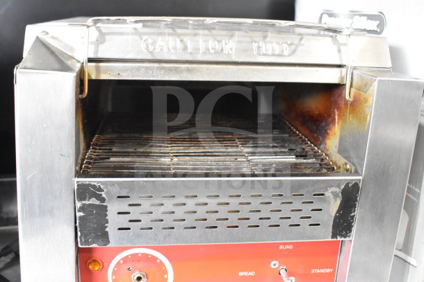 Avantco 184T140 commercial countertop conveyor toaster, visible wear, 120V, 1 phase, adjustable settings, “Caution Hot” marking.