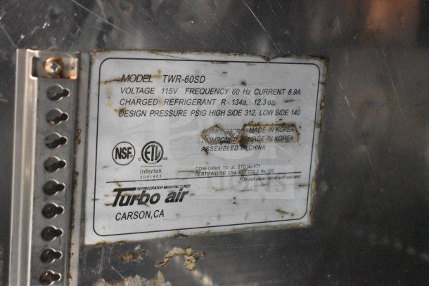 Turbo Air TWR-60SD label showing model, voltage (115V), refrigerant (R-134a, 12.3 oz), and design pressure. Made in Korea.