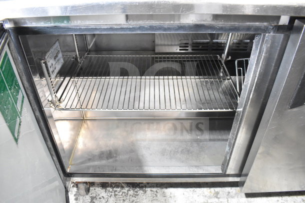 Turbo Air TWR-60SD 2 Door Undercounter Cooler on casters, 115V, stainless steel, commercial use, interior shelves visible.