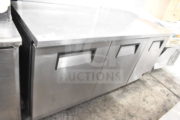True TUC-72 commercial 3-door undercounter cooler on casters, stainless steel, 115V, 1 phase, in used condition.
