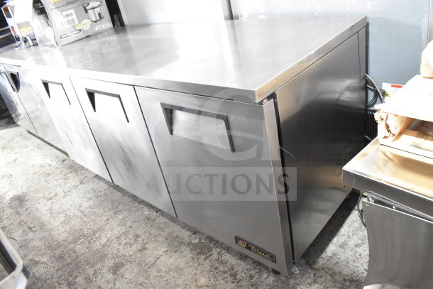 True TUC-72 commercial 3-door undercounter cooler with casters. Stainless steel, 115V, 1 phase. Clean and well-maintained.