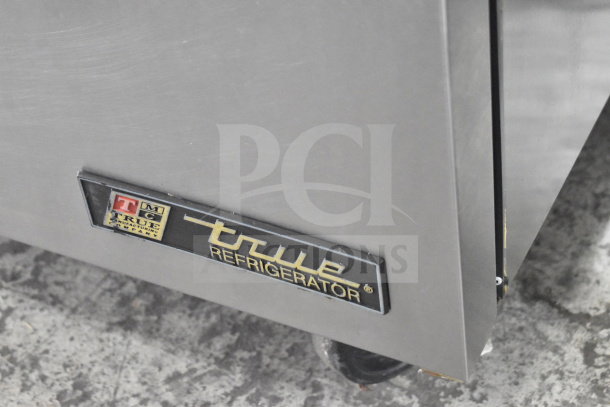 True TUC-72 Commercial 3 Door Undercounter Cooler with casters, 115V, 1 Phase, True Refrigeration logo visible.