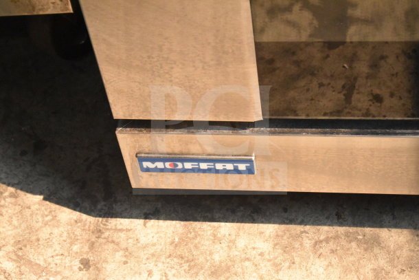 Moffat Turbofan E27M3 commercial convection oven, 208V, stainless steel, visible "Moffat" logo, lightly used condition.