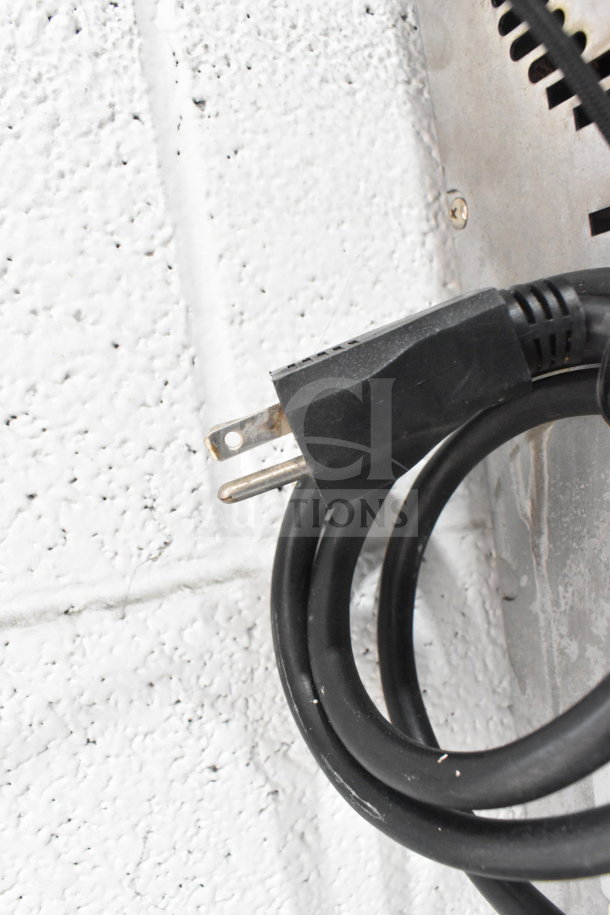 Power cord of a Moffat Turbofan E27M3 convection oven, 208 volts, in good condition.