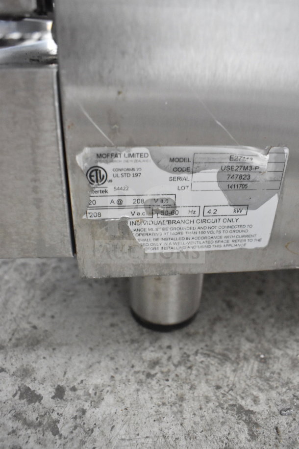 Moffat Turbofan E27M3 convection oven, 208V, ETL certified. Model USE27M3-P, serial 747823 visible on label.