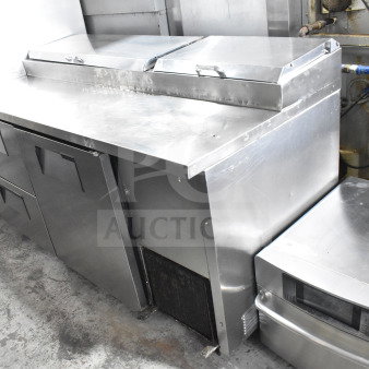 True TPP-67D-2 commercial pizza prep table with door and 2 drawers, stainless steel, excellent condition, 115 volts, 1 phase.