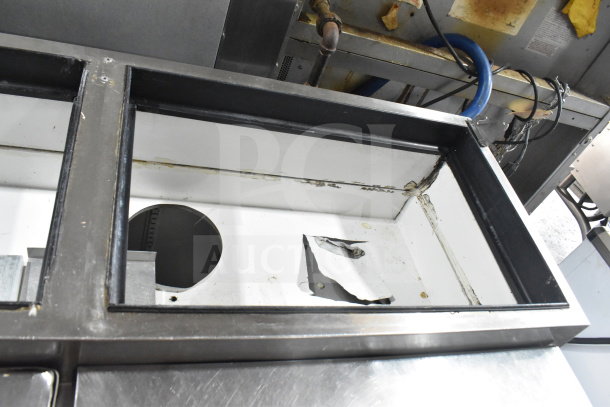 True TPP-67D-2 Commercial Pizza Prep Table, stainless steel, door and 2 drawers, used condition, 115 volts, 1 phase.