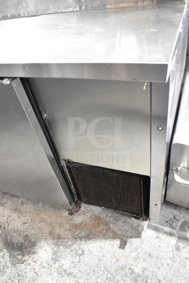 True TPP-67D-2 commercial pizza prep table with door and 2 drawers, stainless steel, 115 volts, 1 phase.