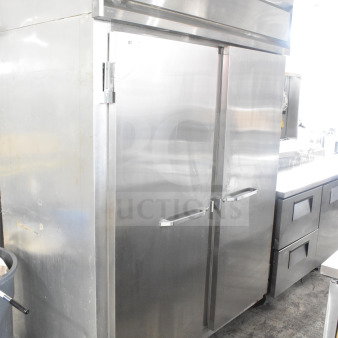 Continental 2RE Commercial 2-Door Reach-In Cooler on casters, stainless steel, 115V, 1 Phase, visible brand label.