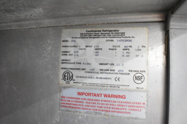 Continental 2RE commercial 2-door reach-in cooler, 115V, 1 phase. Features ETL and NSF certifications. Warning label visible.
