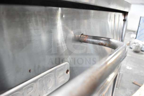 Bakers Pride E541 commercial pizza oven, stainless steel, 2 deck, 208V, 3-phase, on metal legs, visible handle and brand label.