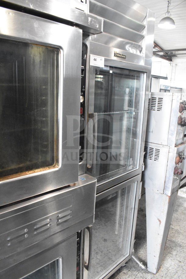 Traulsen RHT132WUT-HHG glass half door refrigerator, stainless steel, 24.2 cu. ft., commercial casters, used condition.