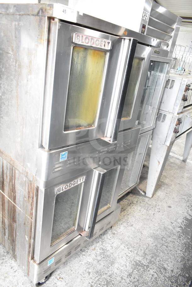 Blodgett commercial gas convection ovens with view-through doors, thermostatic controls; used condition, visible wear.
