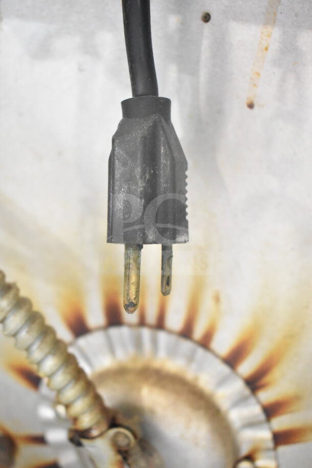 Power cord of Blodgett commercial gas convection oven, displaying standard plug and surrounding metal components.
