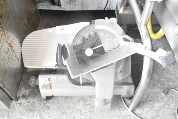 Hobart HS6N commercial 13" manual slicer, heavy-duty, countertop model, 120 volts, 1 phase, in used condition.