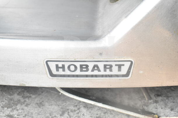 Hobart HS6N Commercial 13" Heavy-Duty Manual Slicer with logo, metal finish, for auction. 120 Volts, 1 Phase.