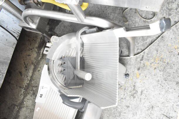 Hobart HS6N Commercial 13" Manual Slicer, heavy-duty, countertop model, 120 volts, 1 phase, in used condition.