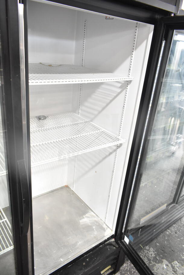 2019 True GDM-49-HC 2 Door Reach-In Cooler Merchandiser, 115V, 1 Phase. Features spacious interior with shelving.