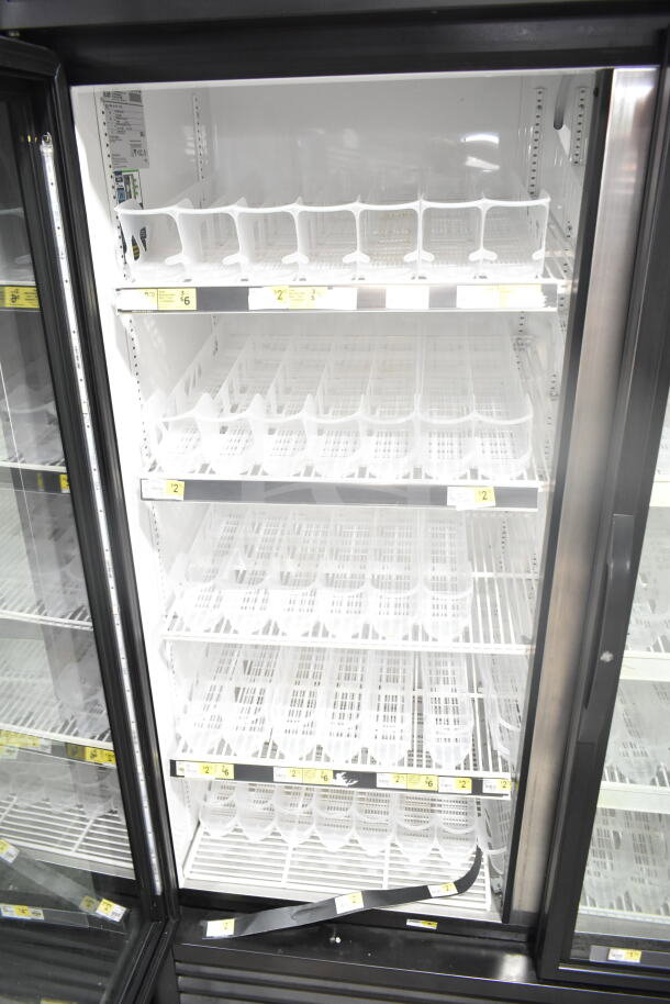 2019 True GDM-49-HC commercial 2-door reach-in cooler merchandiser, 115 volts, 1 phase. Clean interior shelves, clear glass doors.
