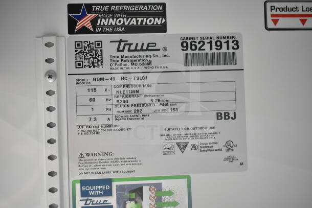 2019 True GDM-49-HC commercial cooler label showing model, voltage, refrigerant type, and serial number 9621913.