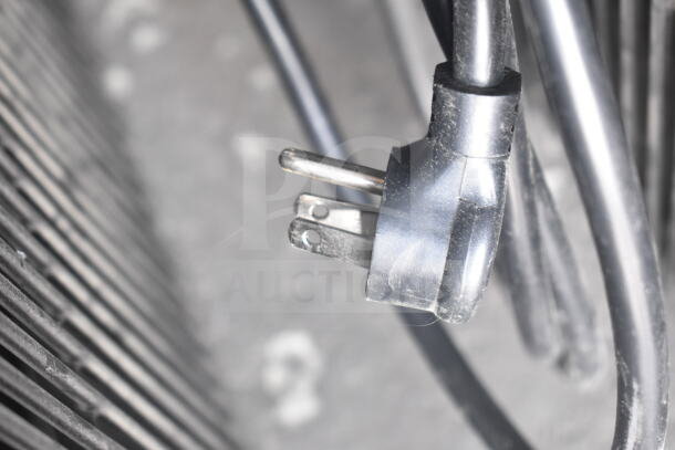 Close-up of a power cord plug for a 2019 True GDM-72-HC 3 Door Reach In Cooler, 115 Volts, 1 Phase.