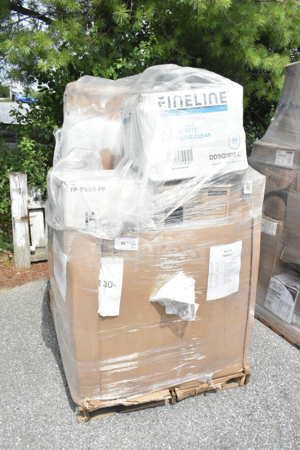 Pallet of 17 new scratch and dent items including carryout bags, meat trays, towels, teaspoons, wrapped in plastic.