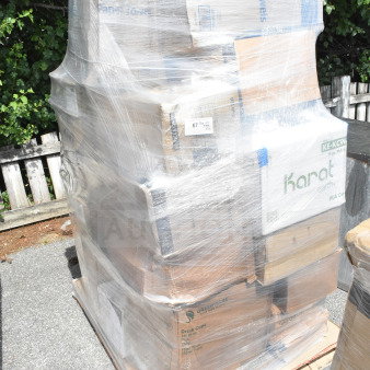 Pallet of 26 new scratch and dent items, including sandwich bags, deli containers, paper towels, wrapped in plastic.
