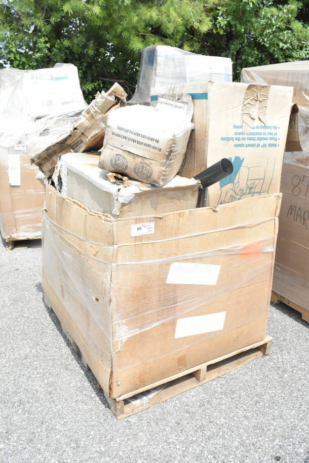 Cardboard box on pallet containing 9 new scratch-and-dent items, including a shelf, pot rack, and grease trap.