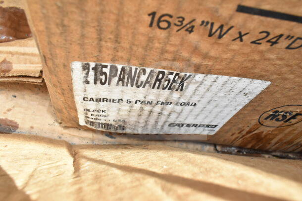 Label on box indicating "Carrier 5 Pan End Load" by CaterGator. Marked as black, made in USA. Box shows wear.