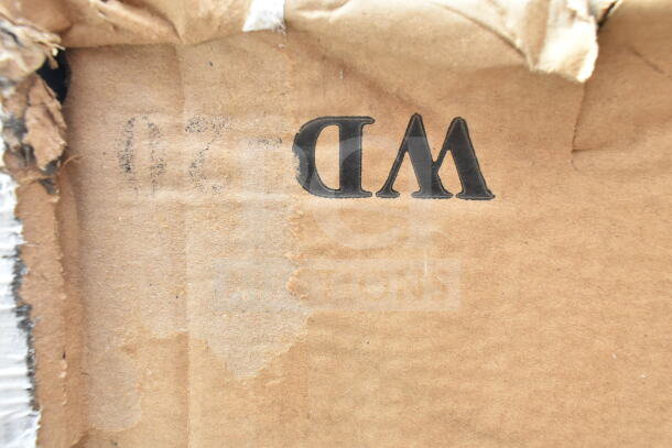 Cardboard with visible "WD" marking, some tears and wear. Appears to be packaging for scratch and dent items.