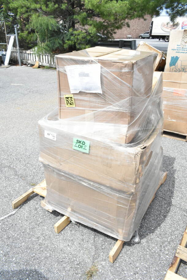 Pallet of five brand new scratch and dent items, including a sink and trash can, wrapped in plastic. Labels indicate item details.