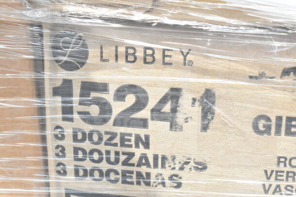 Libbey carton marked "15241," containing scratched and dented bowls, plates, glasses. Includes 3 dozen label in packaging.