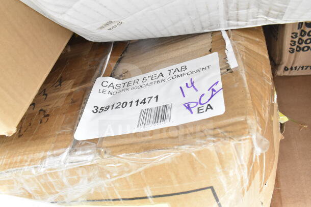 Cardboard box labeled "CASTER 5'' EA TAB," item number 35912011471. Box shows minor damage, indicating scratch and dent condition.