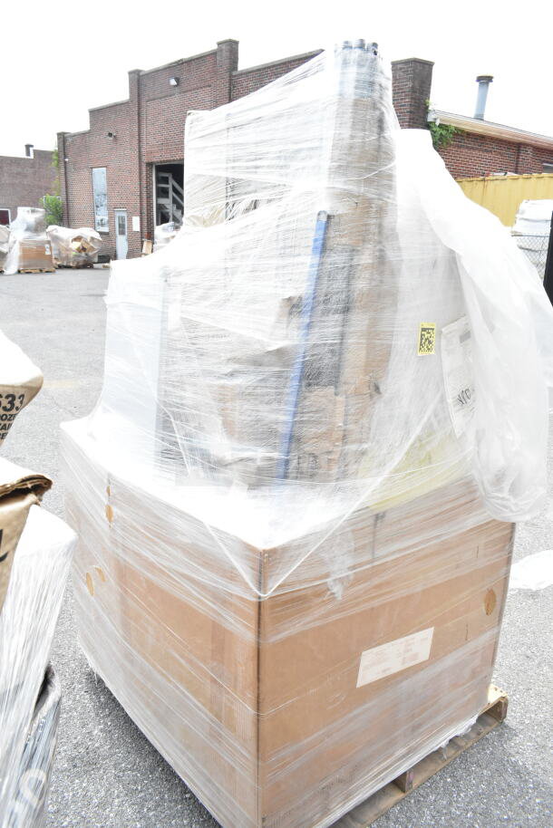Pallet of 14 new scratch and dent items, including a gelato pan and hotel pans, wrapped in plastic. Auction lot 49-JUN.