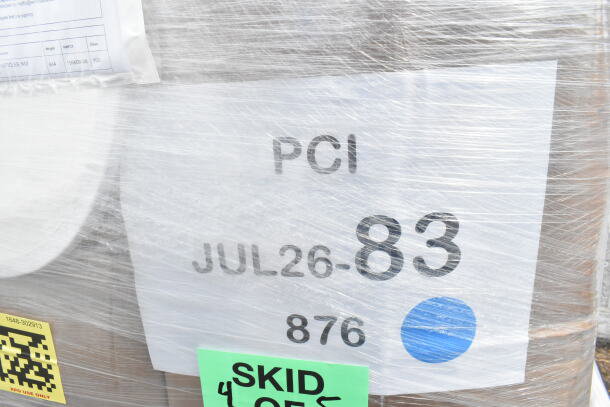 Pallet wrapped with labels "PCI JUL26-83" and "Skid 876," containing 22 new scratch and dent items.