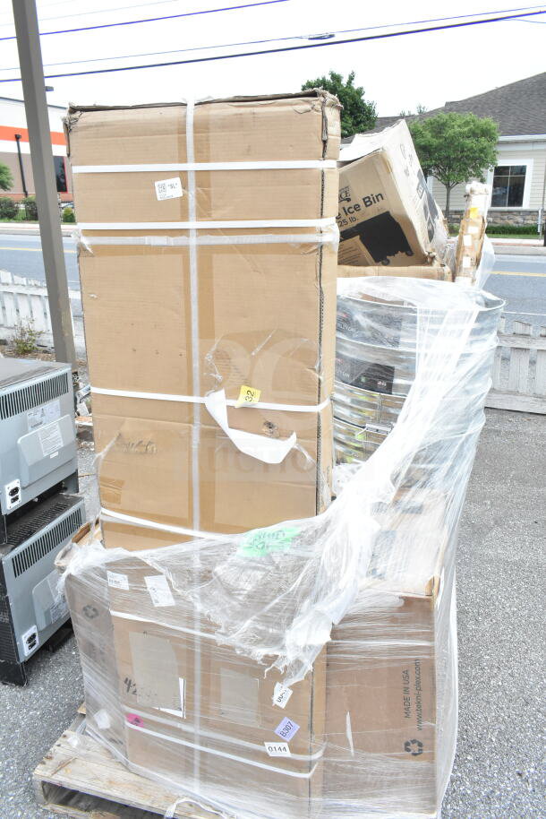 Pallet of 10 brand new scratch and dent items including overshelf, tabletop, trash can. Boxes wrapped in plastic.
