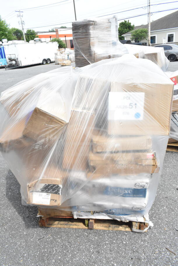 Plastic-wrapped pallet with 35 mixed household items, including plates and baking sheets. Label reads "JUL26-51."