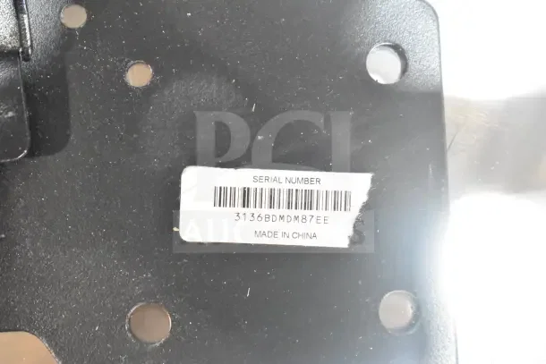 Close-up of a Tripp Lite bracket with a label showing serial number 3136BDM87EE, "Made in China." 