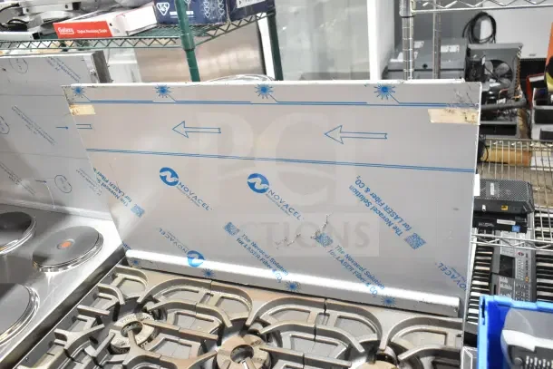 Brand new Imperial Range Pro IR-6-XB, 6-burner, 36", 192,000 BTU, LP, scratch and dent, protective wrap visible.