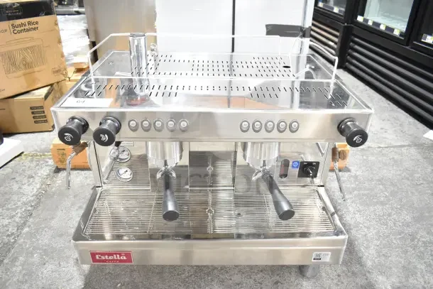 Brand new Estella ECEM2/N2 commercial espresso machine, two group, with 3 portafilters, 220-240V, 1 phase, stainless steel.