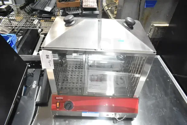 Brand new Avantco 177HDS200 Hot Dog Steamer, holds 200 dogs/48 buns, stainless steel, 120V, user manual included.