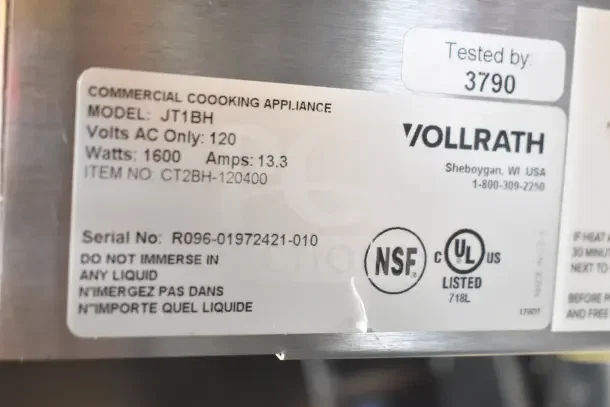 Brand new Vollrath JT1BH conveyor toaster, 120V, 2 1/2" opening. Model, voltage, and certification labels visible.