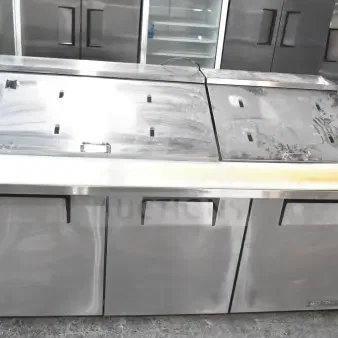 2018 True TSSU-72-30MB-ST-HC sandwich prep table, stainless steel, 115V, 1 phase, visible wear, commercial casters.