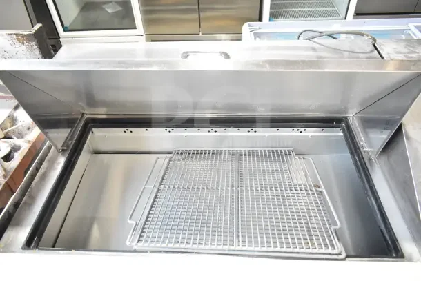 2018 True TSSU-72-30MB-ST-HC commercial sandwich prep table, open view. Features stainless steel construction, 115V, excellent condition.